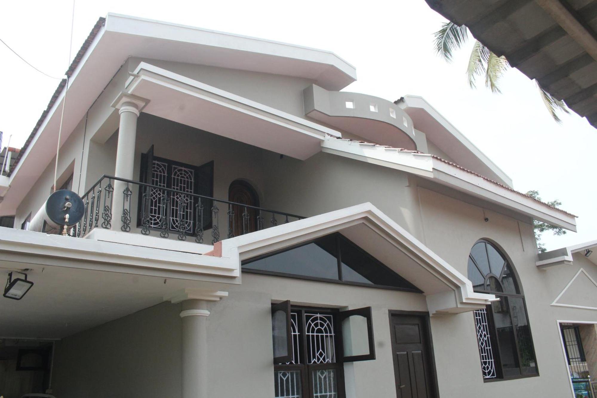 Tropical Villa Homestay มังคาลอร์ ภายนอก รูปภาพ